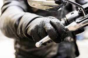 motorcyclist hand on brake