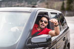 road rage driver in red shirt