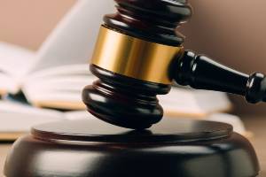 law book behind gavel