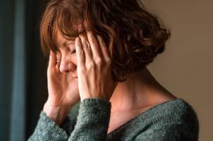 woman suffering from headache