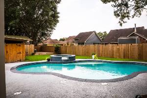 pool in backyard of house