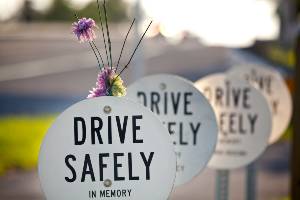drive safely memorial signs on roadside