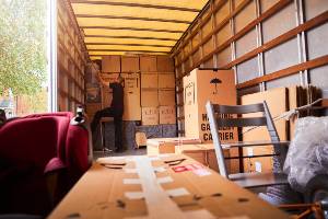 inside moving truck being packed