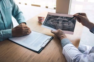 dentist explaining dental x-ray