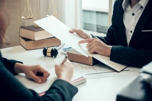 A lawyer going over documents.