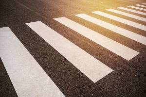 overhead shot of crosswalk on road