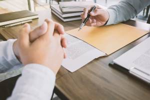 lawyer going over legal documents