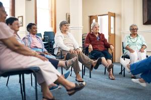 semi-circle of elderly women at physical therapy