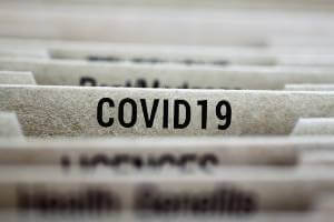 covid-19 file in cabinet with other files