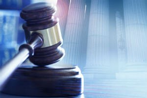 gavel superimposed over courthouse steps