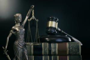 statue near legal books