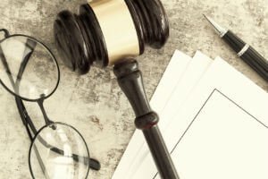 papers underneath gavel