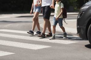 kids in crosswalk during day