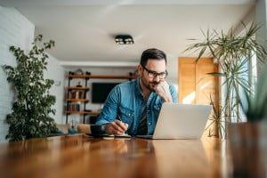 man working on laptop
