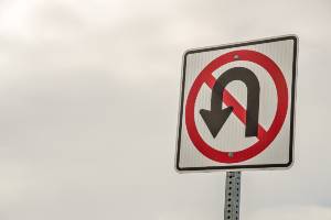 no u-turn sign on overcast day