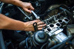 using socket wrench on engine